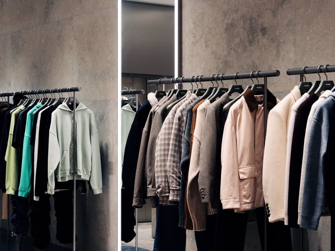 A rack of shirts and pants in a store